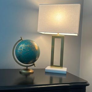 Blue and gold world globe